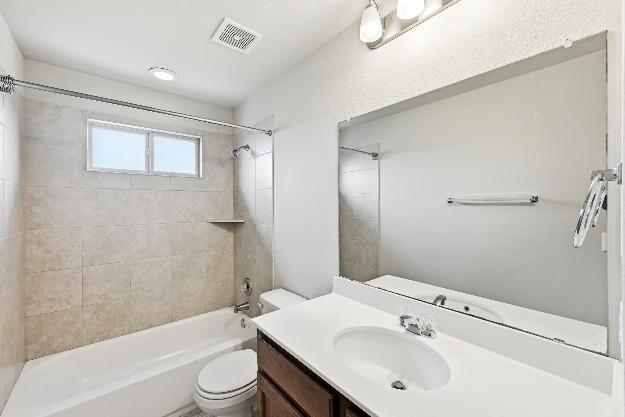 171 Vestral Road Buda, TX 78610 - Photo 22 of 26 Upstairs full Bathroom featuring vanity and shower / bathtub combination