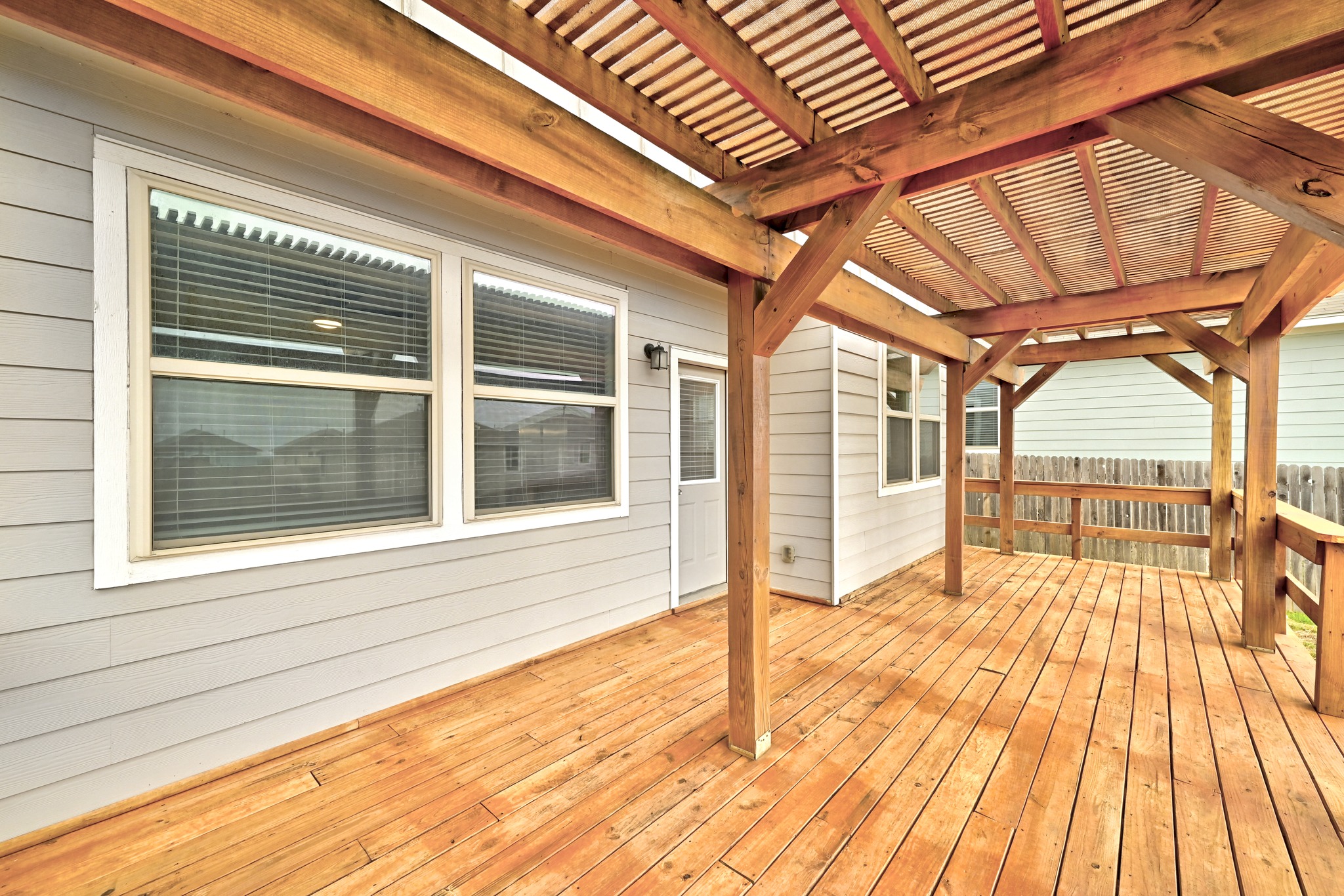 171 Vestral Road Buda, TX 78610 - Photo 26 of 26 View of wooden deck