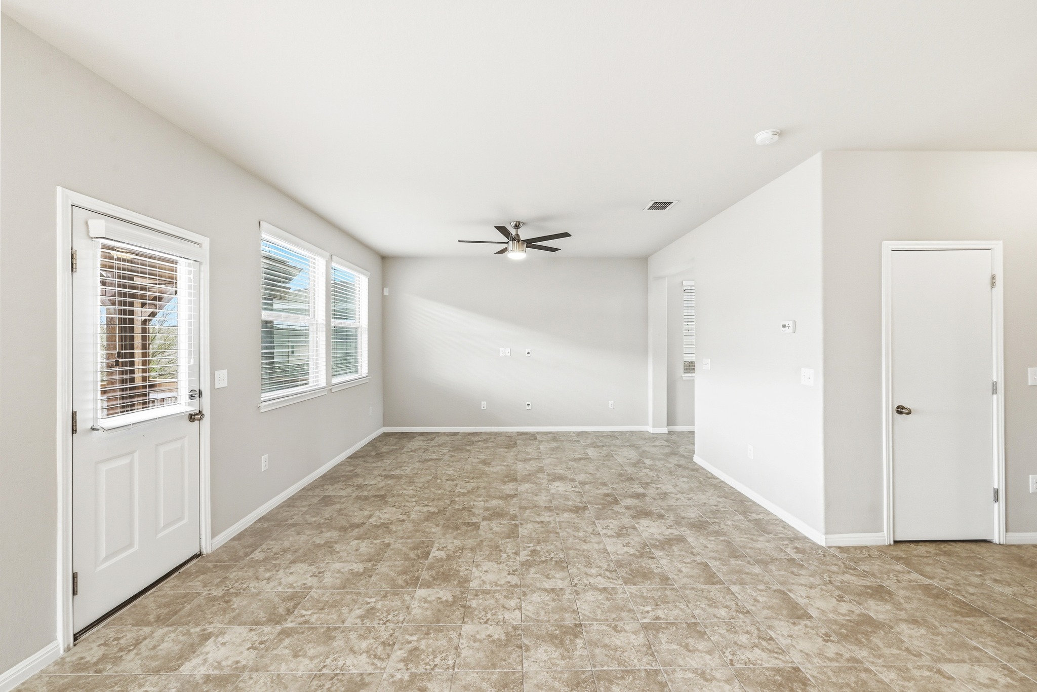 171 Vestral Road Buda, TX 78610 - Photo 7 of 26 Family room overlooking rear deck and yard