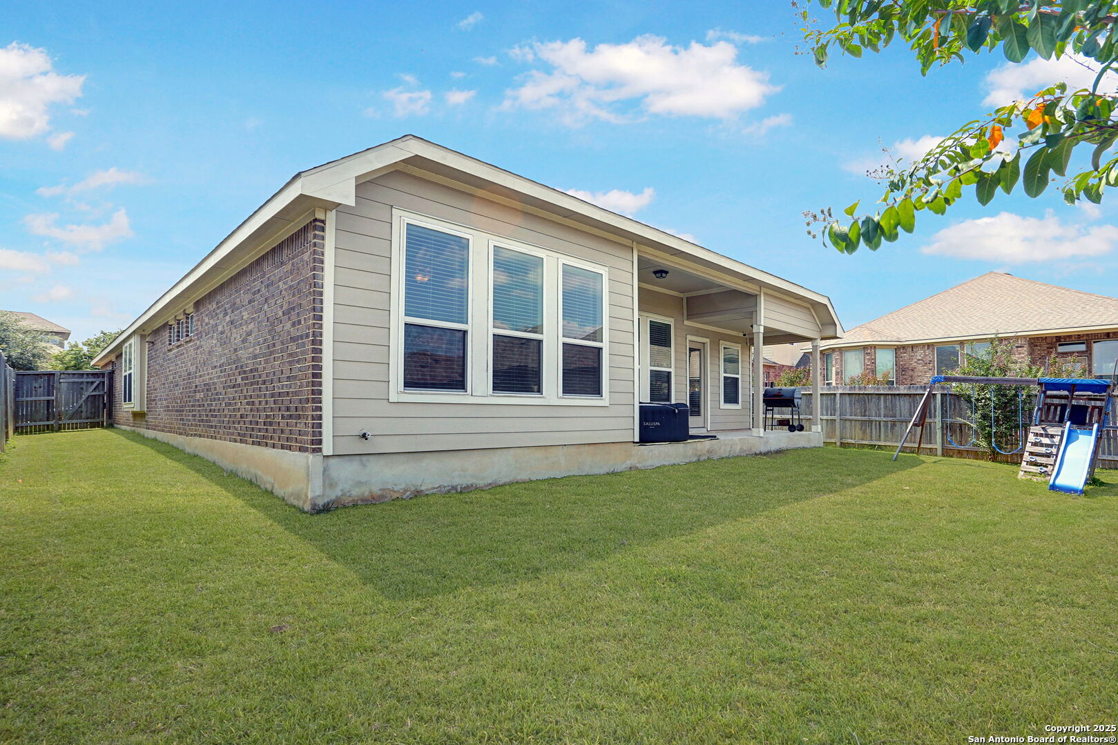 9825 Jon Boat Way Boerne, TX 78006 - Photo 24 of 25 a front view of a house with garden