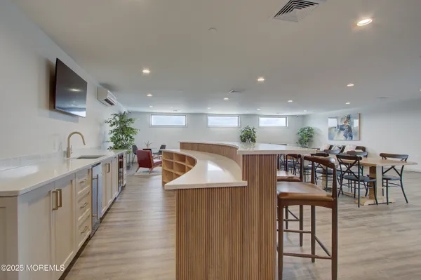 a kitchen with a table and chairs in it