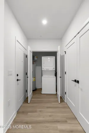 a bathroom with a sink vanity and a toilet