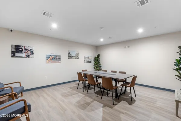 a view of hallway with stairs and a hallway