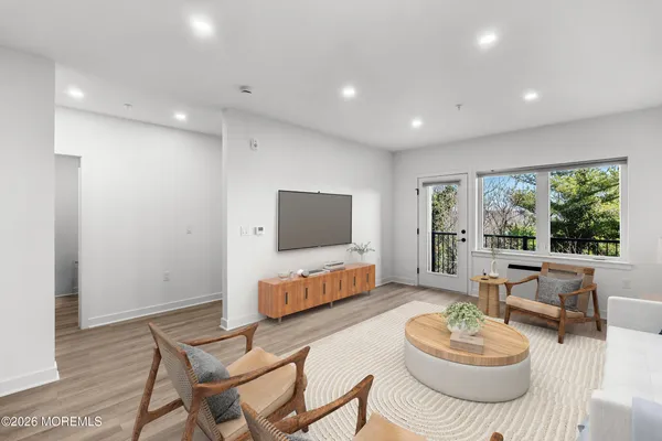 a kitchen with a sink stainless steel appliances and cabinets