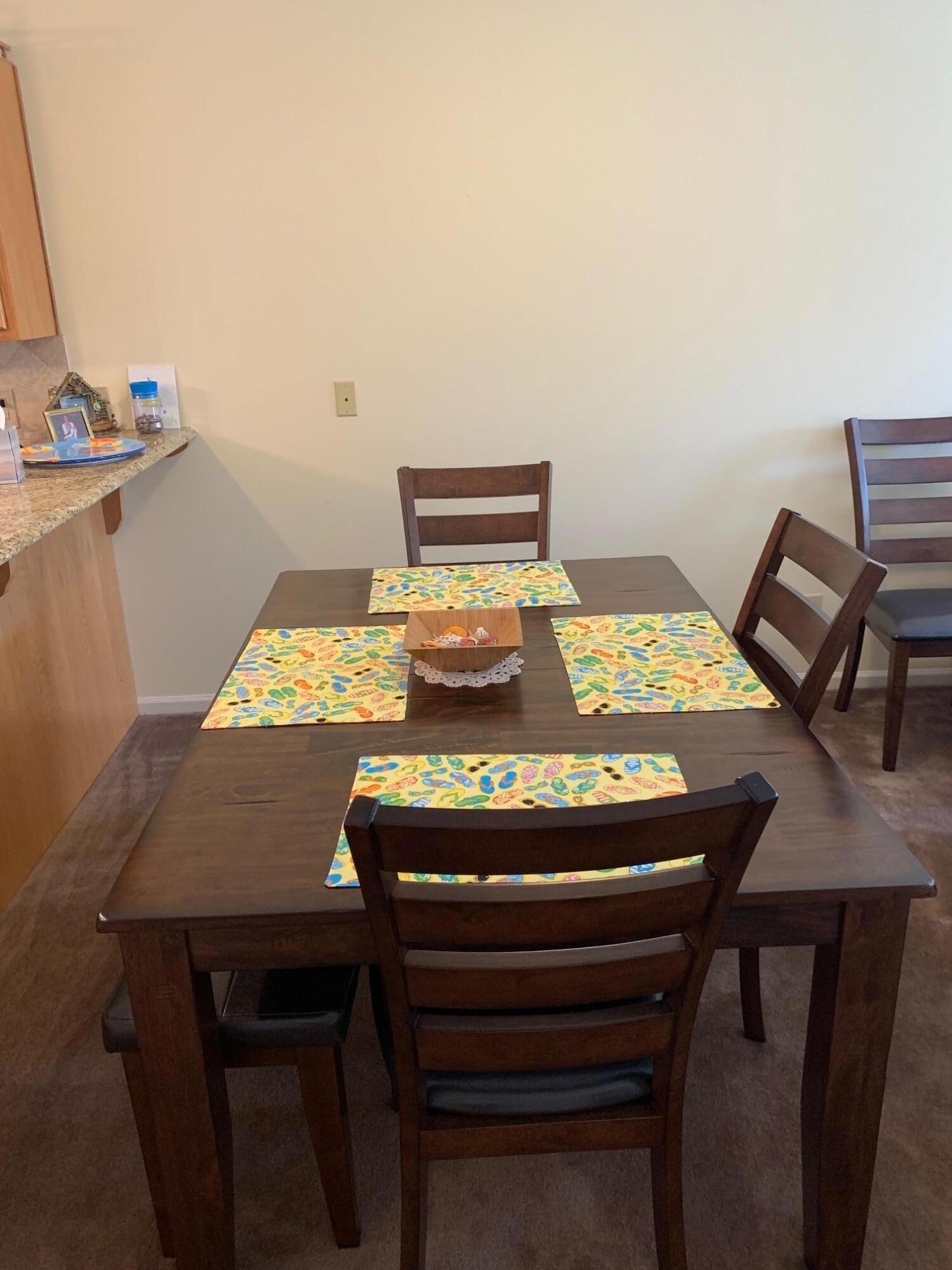 610 Monte Vista Road, Unit 706 Union Hall, VA 24176 - Photo 12 of 25 a view of a dining room with furniture and wooden floor