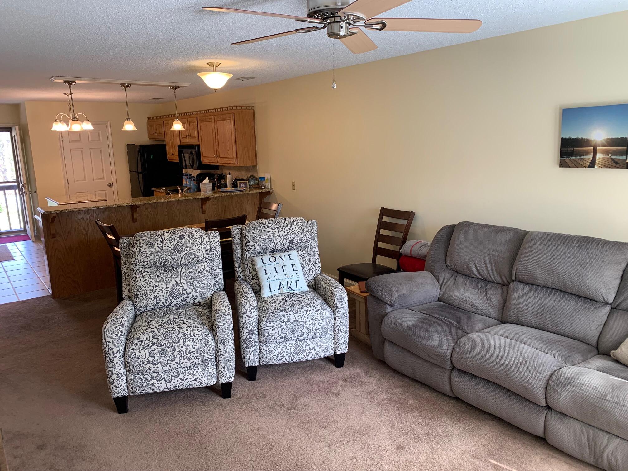 610 Monte Vista Road, Unit 706 Union Hall, VA 24176 - Photo 14 of 25 a living room with furniture and a wooden floor