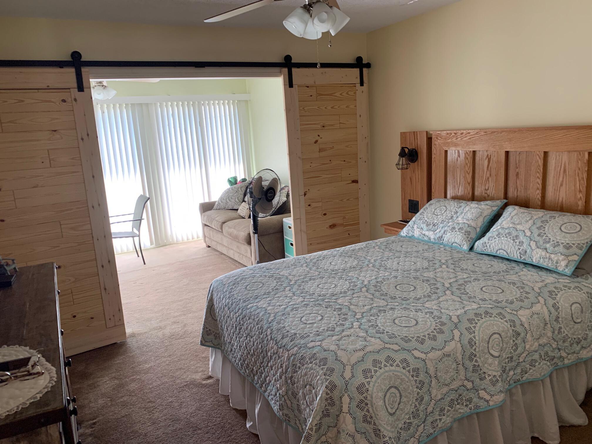 610 Monte Vista Road, Unit 706 Union Hall, VA 24176 - Photo 15 of 25 a bedroom with a bed and a dresser