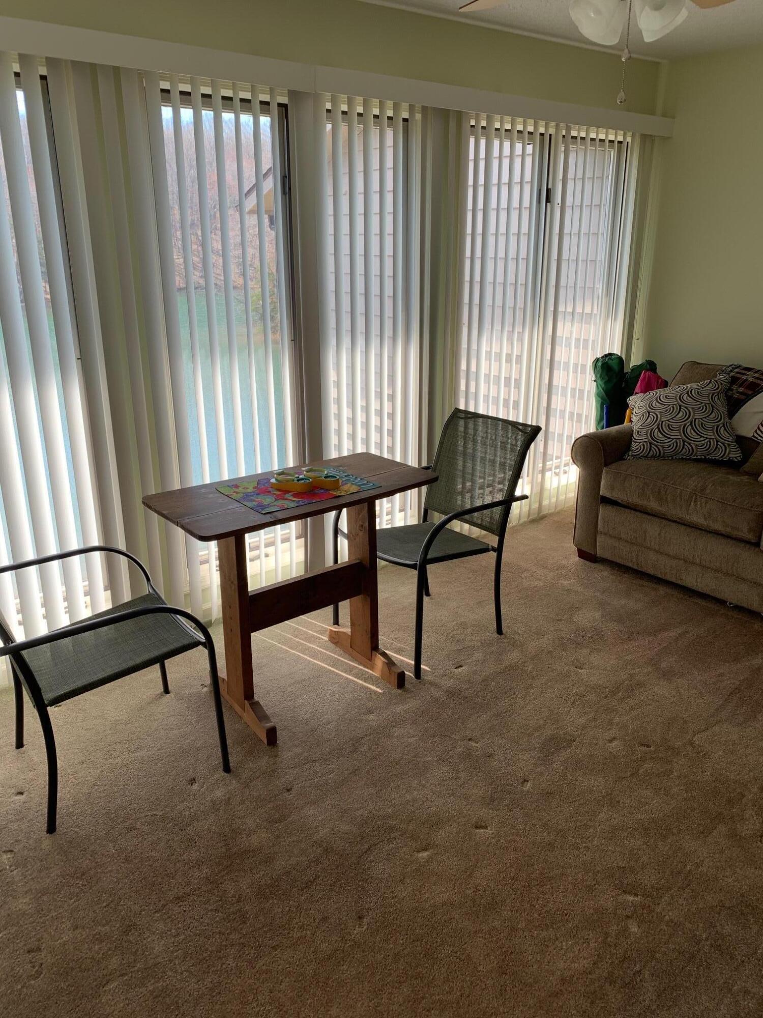 610 Monte Vista Road, Unit 706 Union Hall, VA 24176 - Photo 18 of 25 a living room with furniture and a window