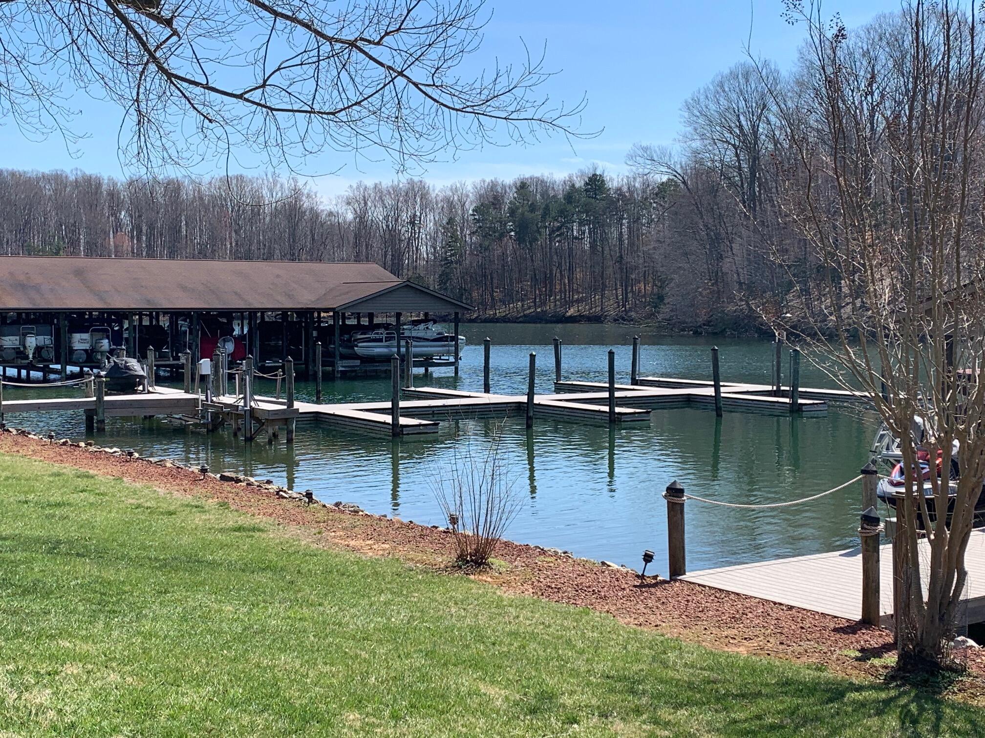 610 Monte Vista Road, Unit 706 Union Hall, VA 24176 - Photo 22 of 25 a view of a lake with a house in the background