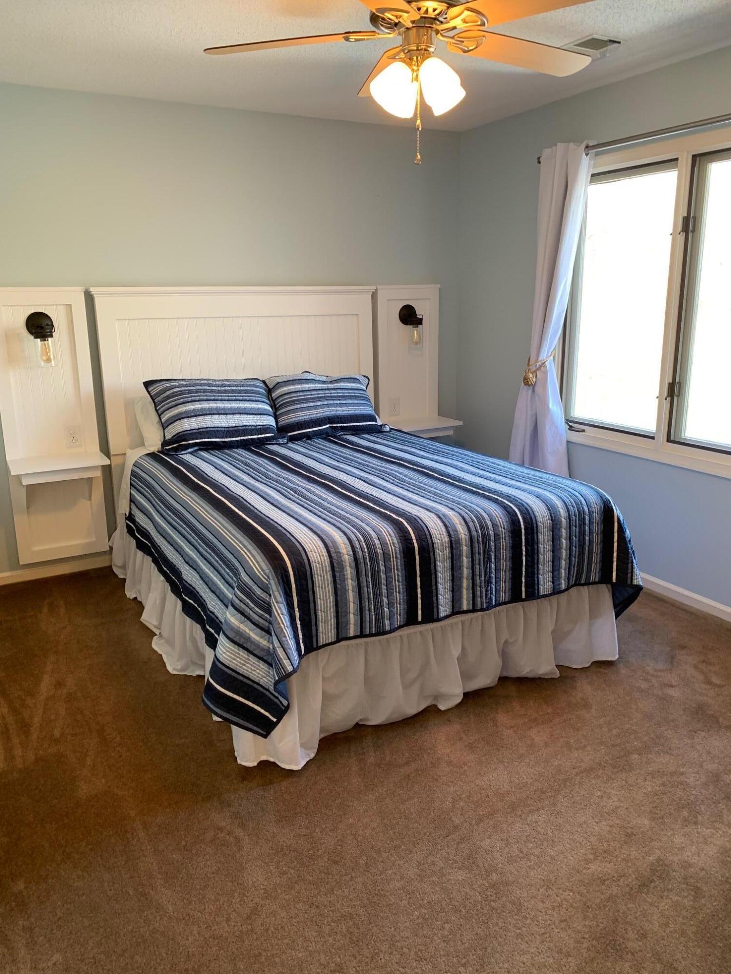610 Monte Vista Road, Unit 706 Union Hall, VA 24176 - Photo 5 of 25 a spacious bedroom with a bed and window