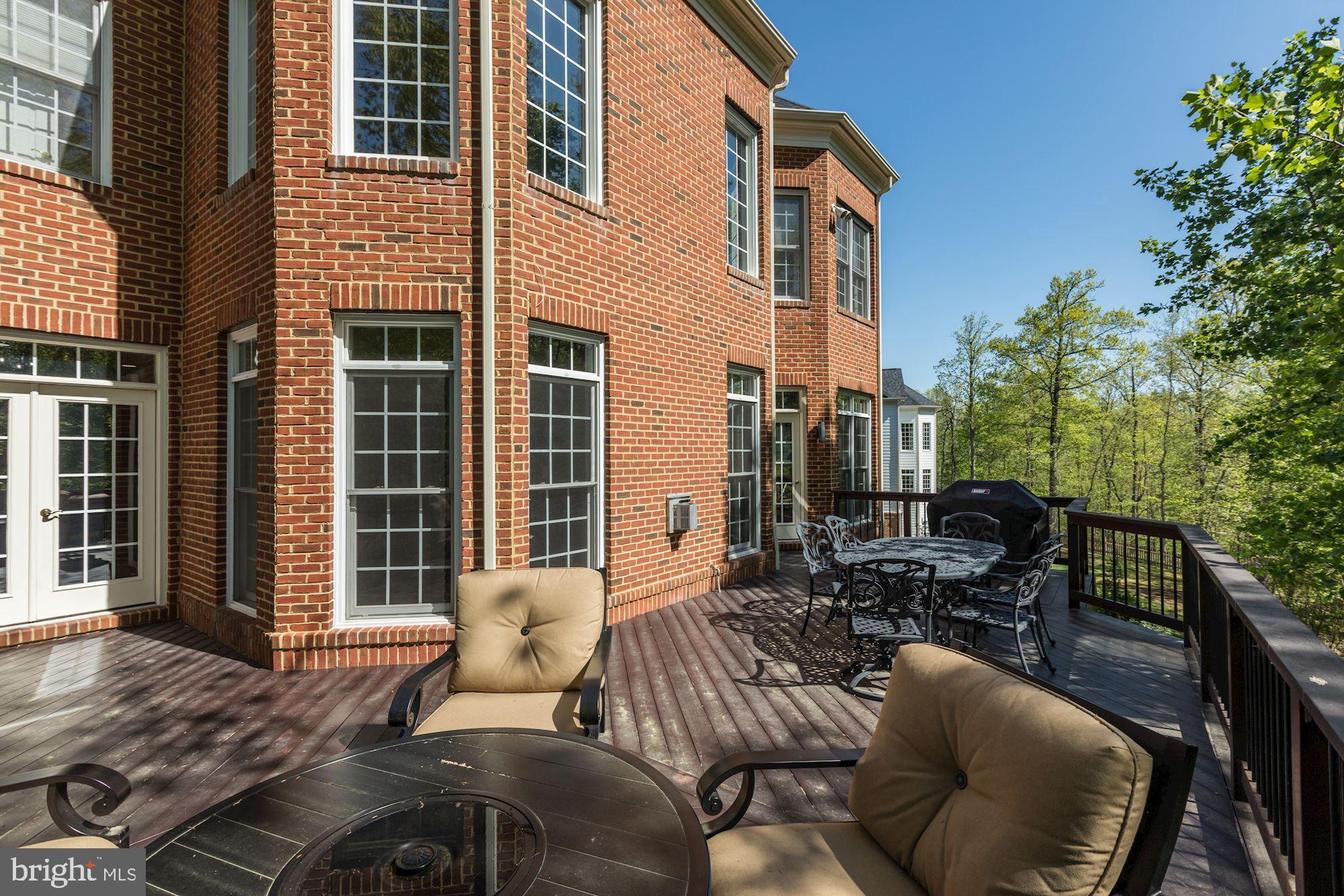 43285 Overview Place Leesburg, VA 20176 - Photo 12 of 91 Teak wood deck with wrought iron spindles