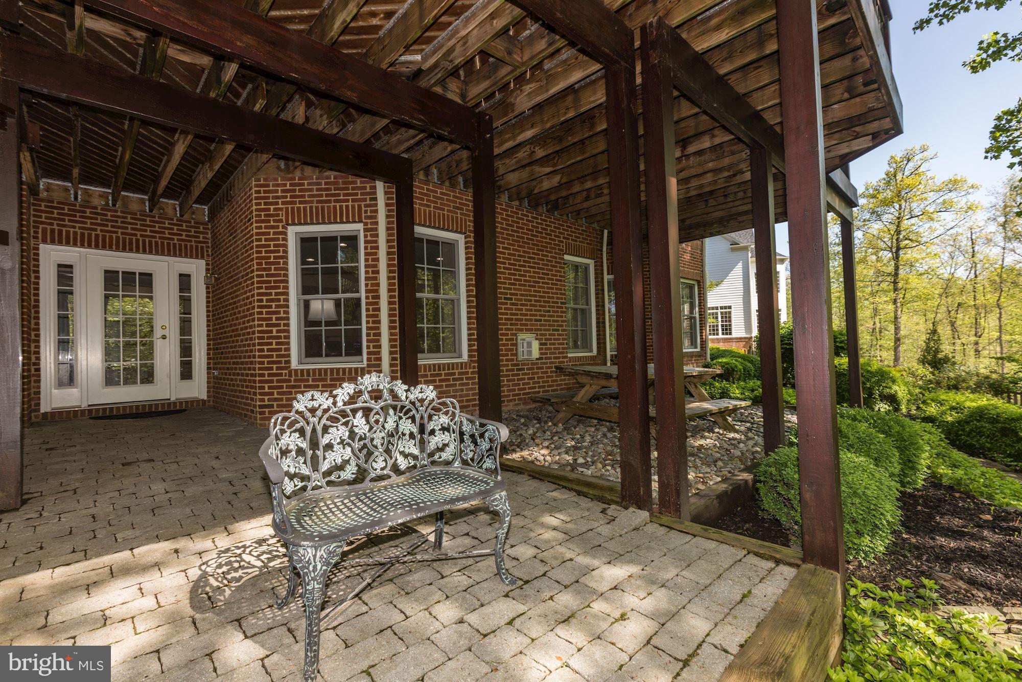 43285 Overview Place Leesburg, VA 20176 - Photo 9 of 91 Sitting area under deck to enjoy Goose Creek