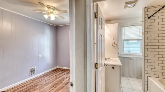 a view of a bedroom from the hallway