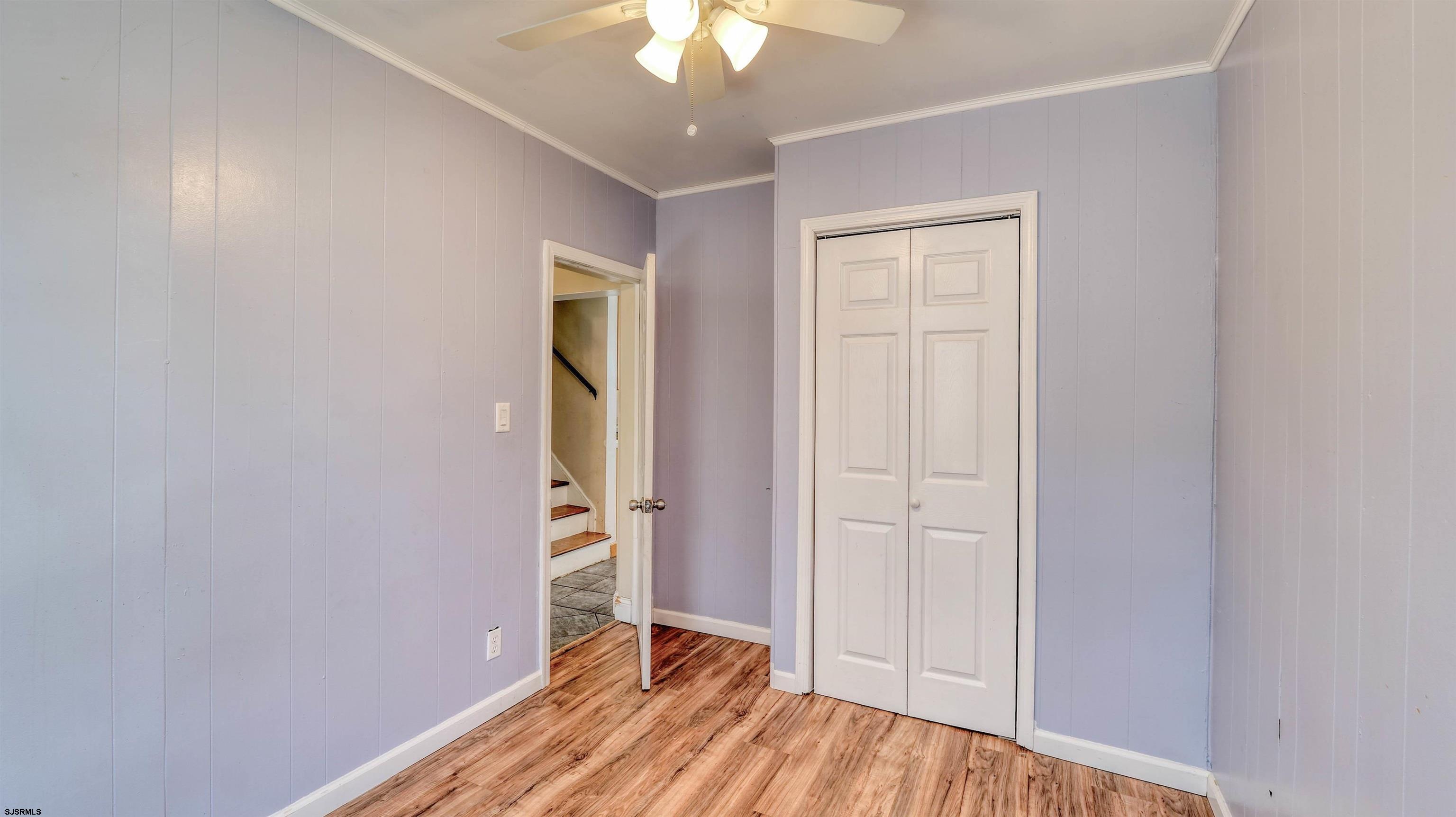 137 West Johnson Avenue Somers Point, NJ 08244 - Photo 19 of 33 wooden floor in an empty room with a window