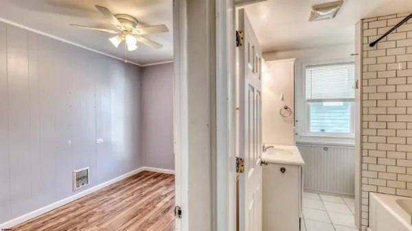 a view of a bedroom from the hallway