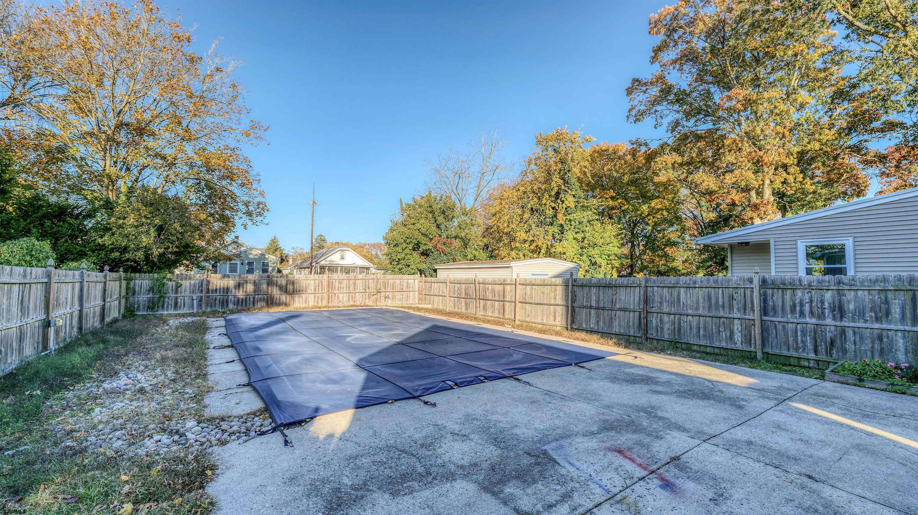 137 West Johnson Avenue Somers Point, NJ 08244 - Photo 28 of 33 a view of backyard with wooden fence