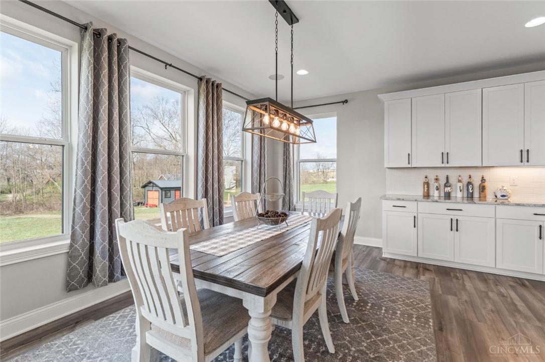 2425 Middleboro Road Clarksville, OH 45113 - Photo 45 of 91 This bright dining area offers expansive outdoor views, ideal for gatherings and everyday meals.