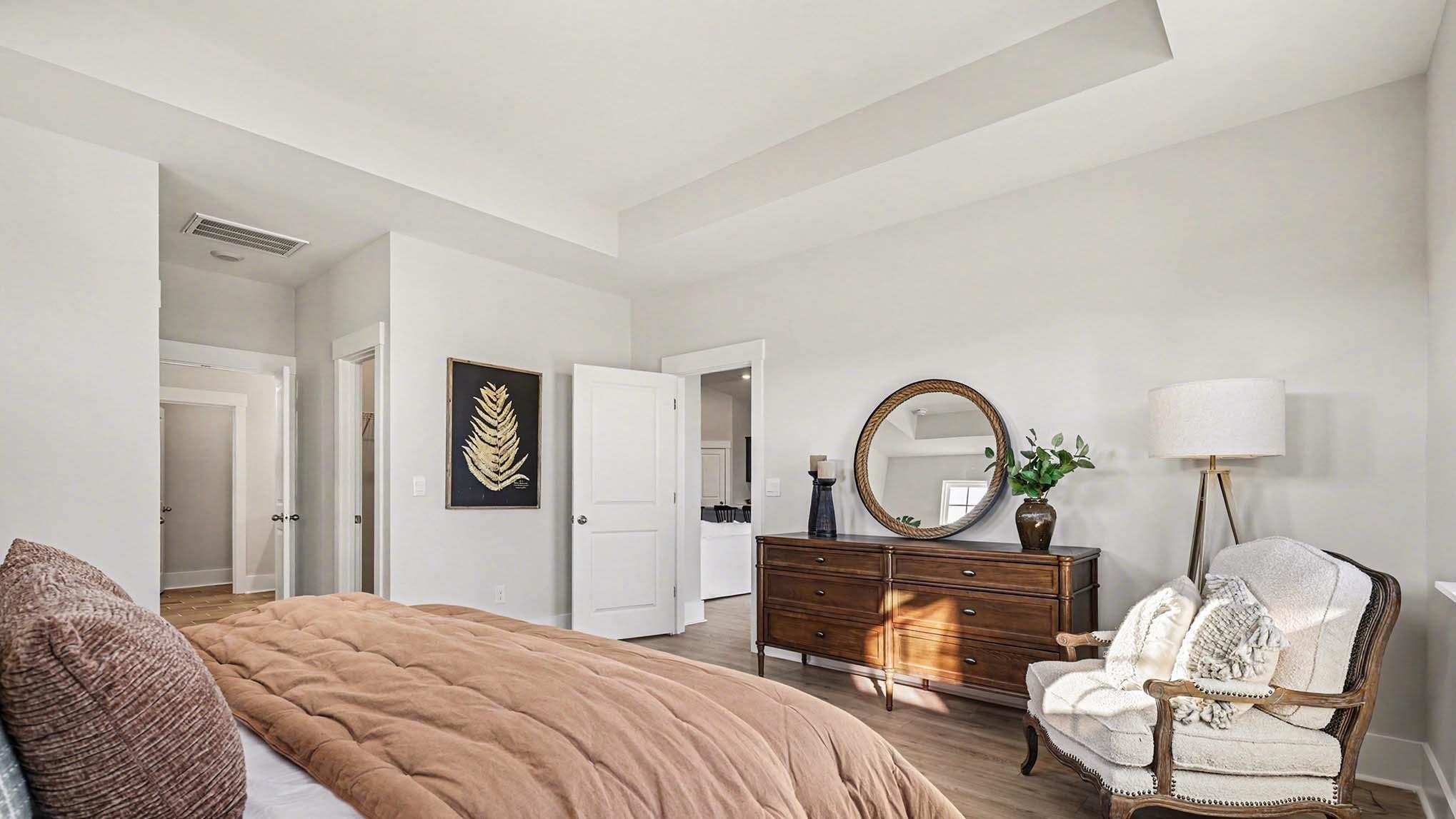 3250 Moss Bridge Lane Myrtle Beach, SC 29579 - Photo 13 of 29 Bedroom featuring wood finished floors and a tray ceiling
