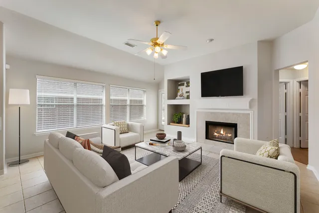 a kitchen with stainless steel appliances a refrigerator sink and microwave