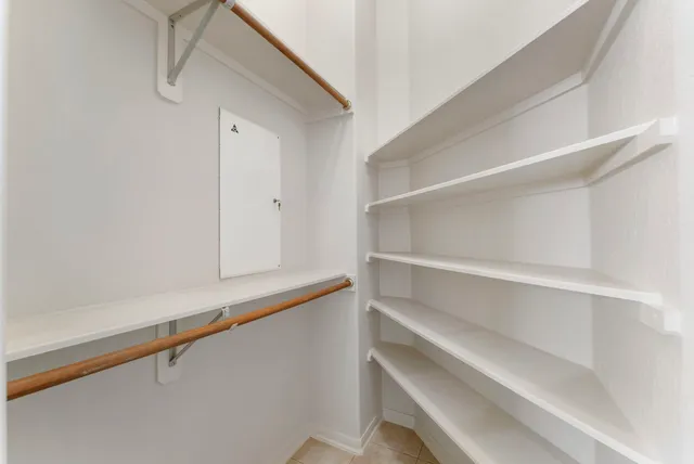 a view of a room with racks on the wall