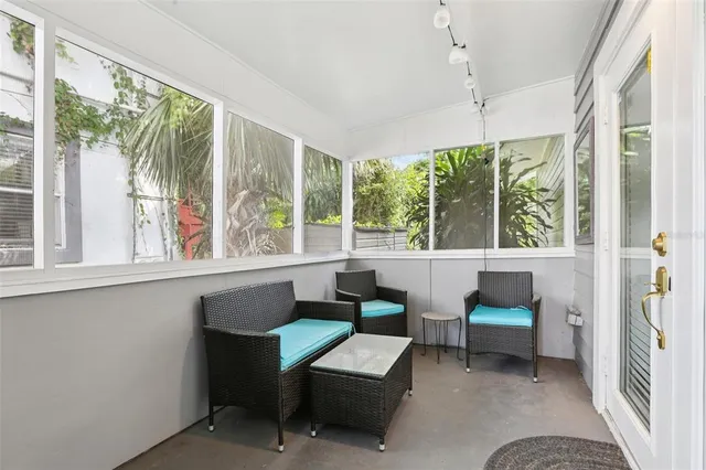 a room with furniture and a window