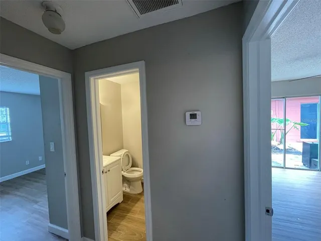 a view of bathroom with a toilet