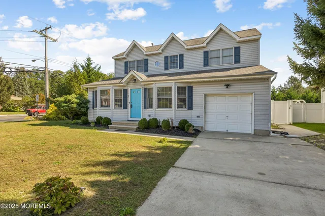 a front view of a house with swimming pool