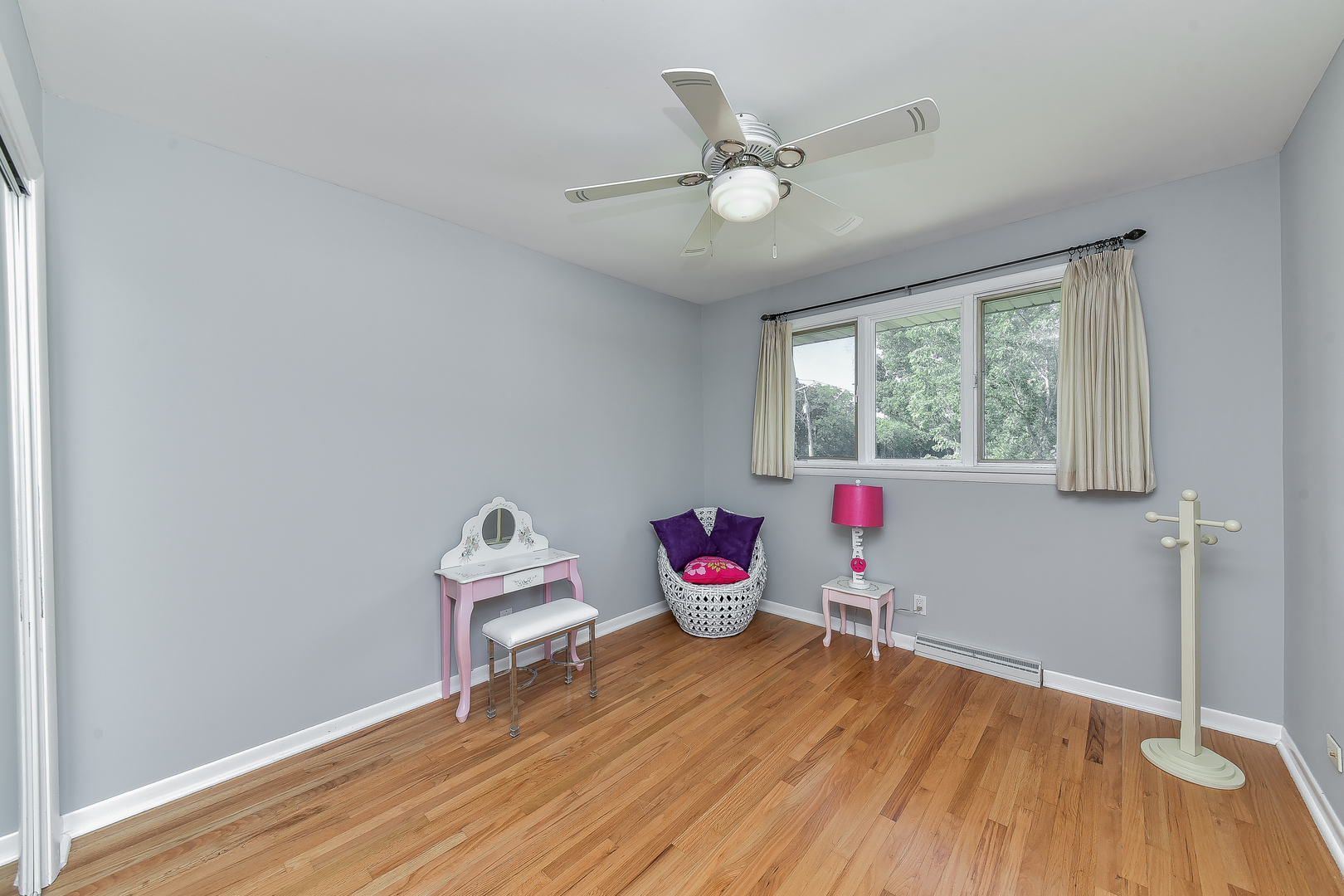 8645 Brookridge Road Downers Grove, IL 60516 - Photo 15 of 23 a workspace with wooden floor and windows