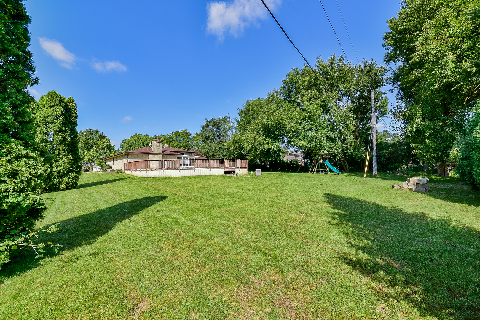 8645 Brookridge Road Downers Grove, IL 60516 - Photo 22 of 23 a view of green field with trees in the background