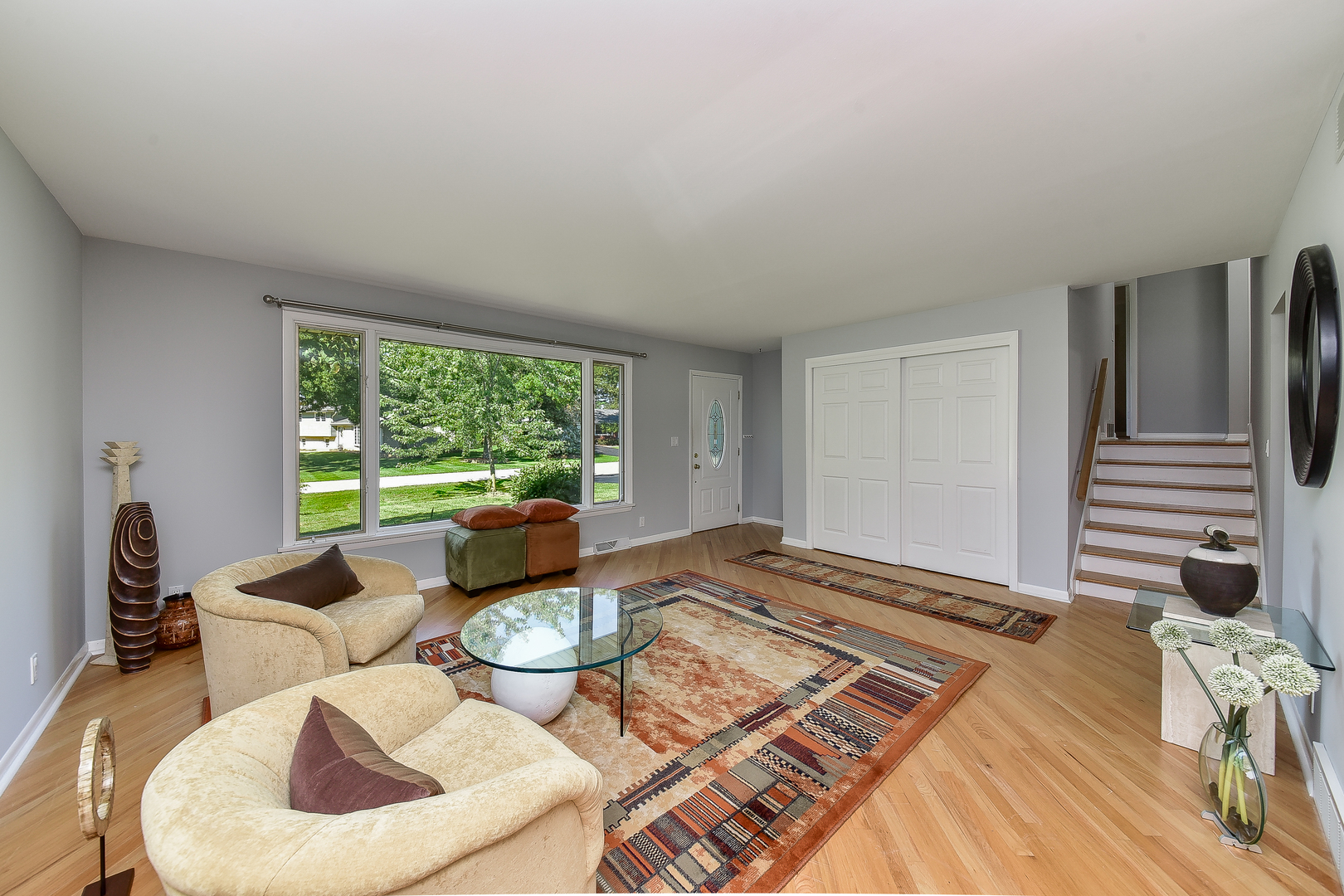 8645 Brookridge Road Downers Grove, IL 60516 - Photo 5 of 23 a living room with furniture and a large window
