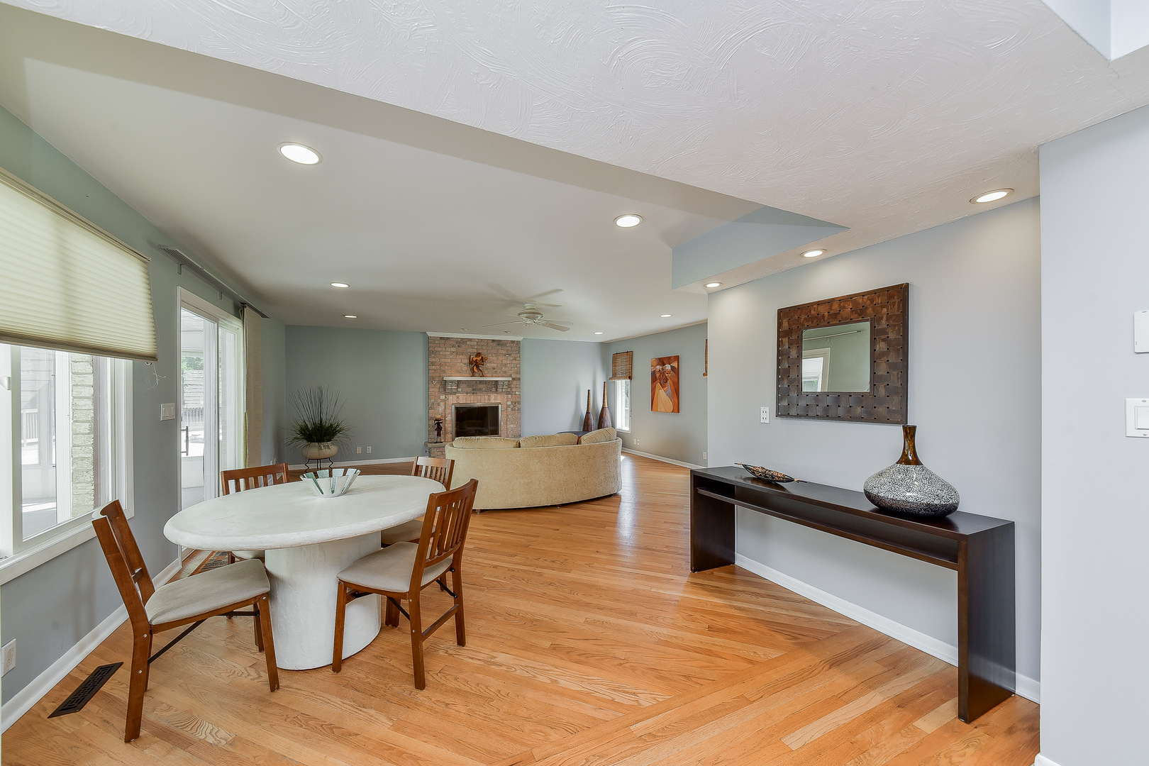 8645 Brookridge Road Downers Grove, IL 60516 - Photo 8 of 23 a view of a dining room with furniture window and wooden floor