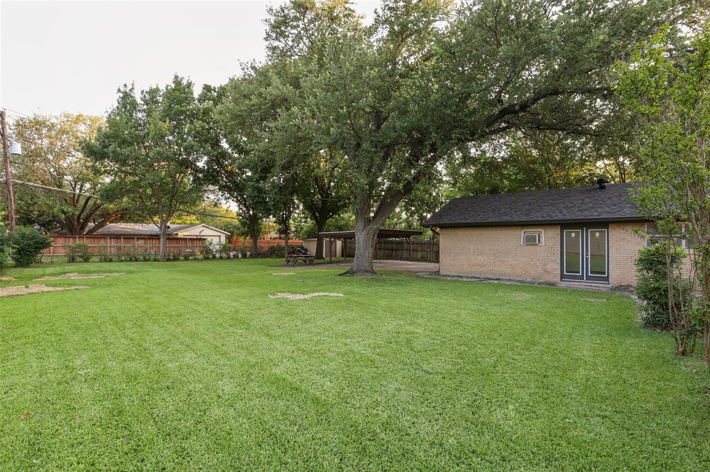 3126 Jubilee Trail Dallas, TX 75229 - Photo 36 of 38 a front view of a house with garden