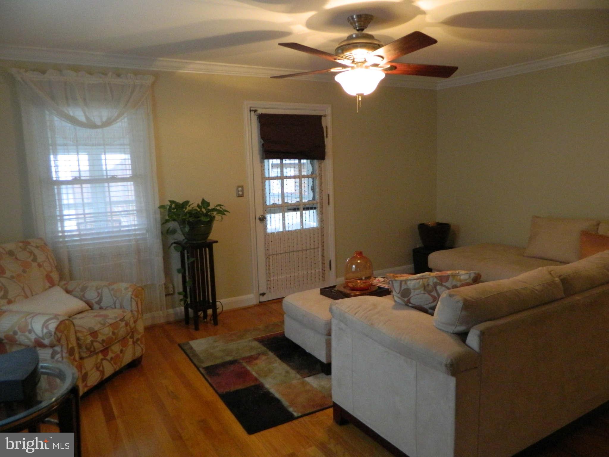 4209 Darnall Road Baltimore, MD 21236 - Photo 6 of 30 Living Room Opens to 3-Season Room