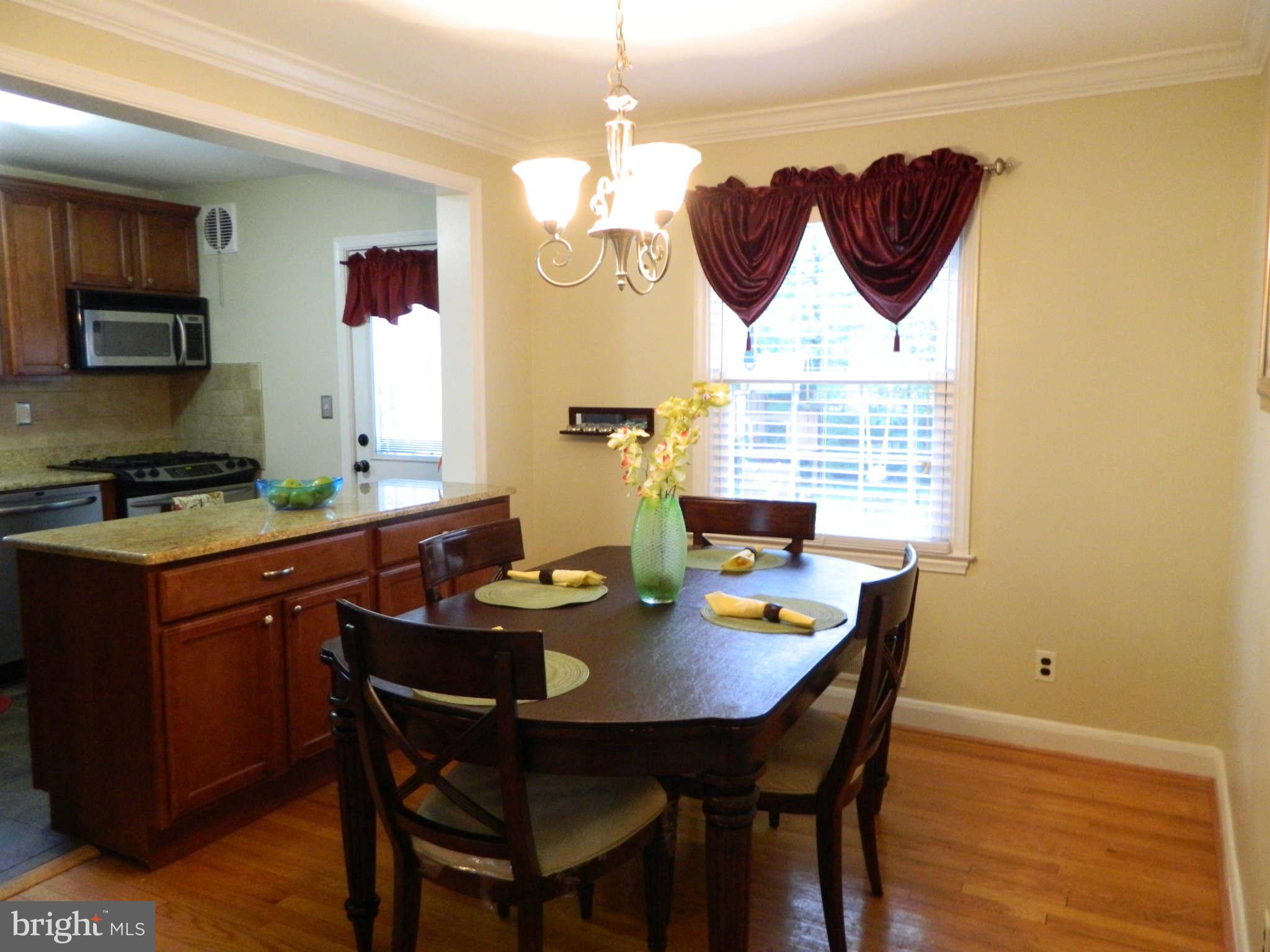 4209 Darnall Road Baltimore, MD 21236 - Photo 8 of 30 Dining Room With Hardwood Floors