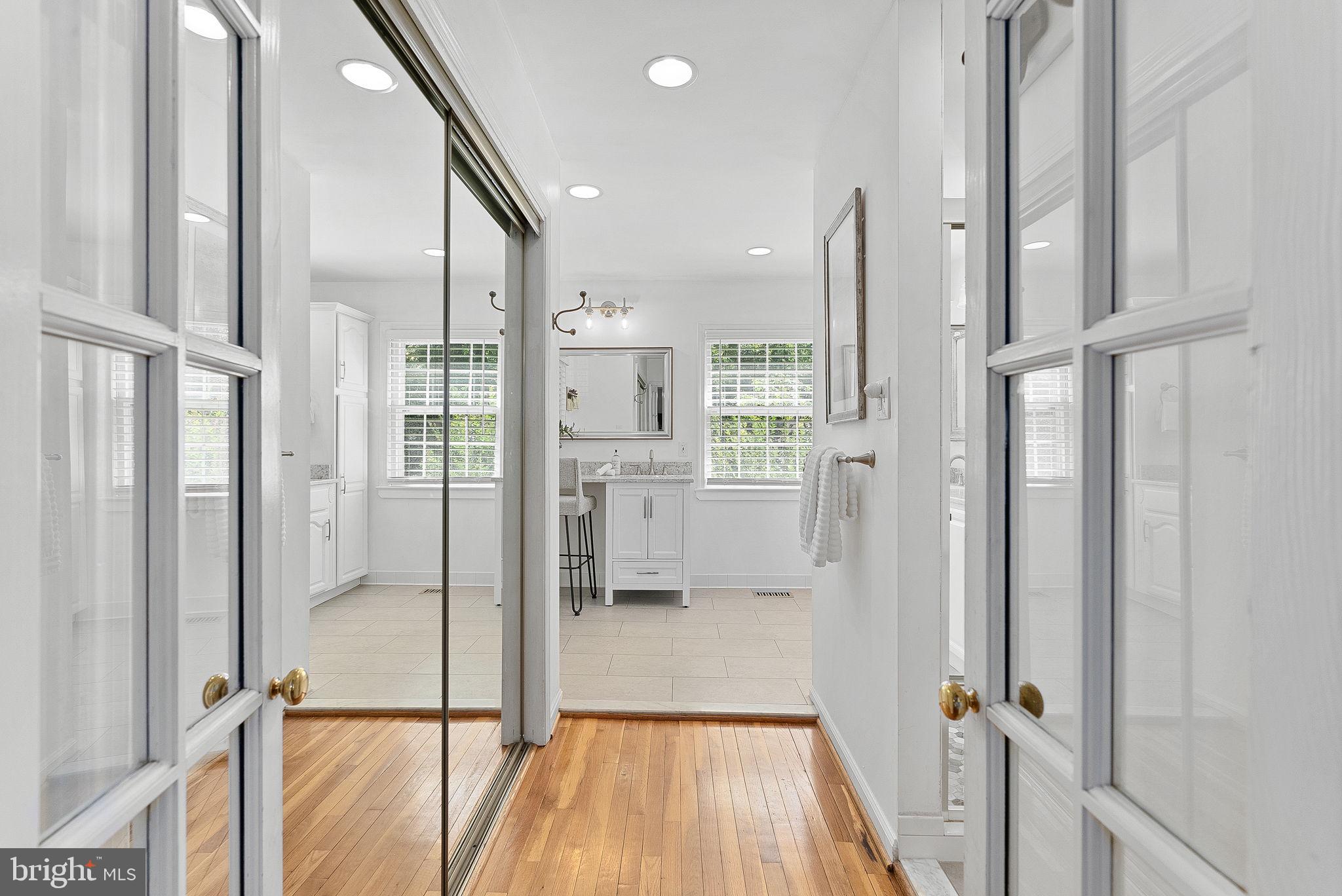 12016 Edgepark Court Potomac, MD 20854 - Photo 35 of 67 Hallway leading to a full bathroom