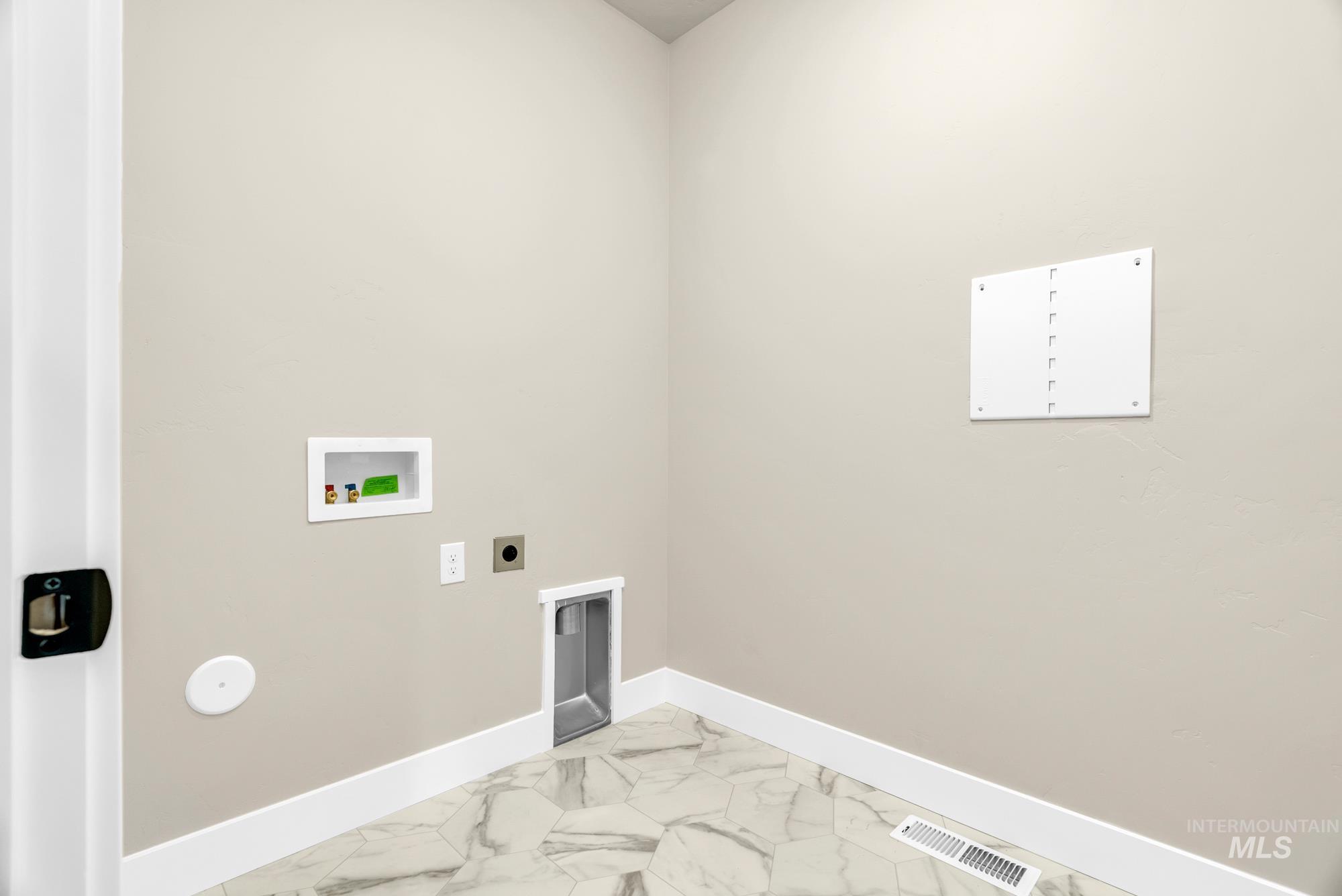 2772 West Jutland Street Meridian, ID 83642 - Photo 19 of 25 Laundry area featuring marble finish flooring, hookup for an electric dryer, and hookup for a washing machine