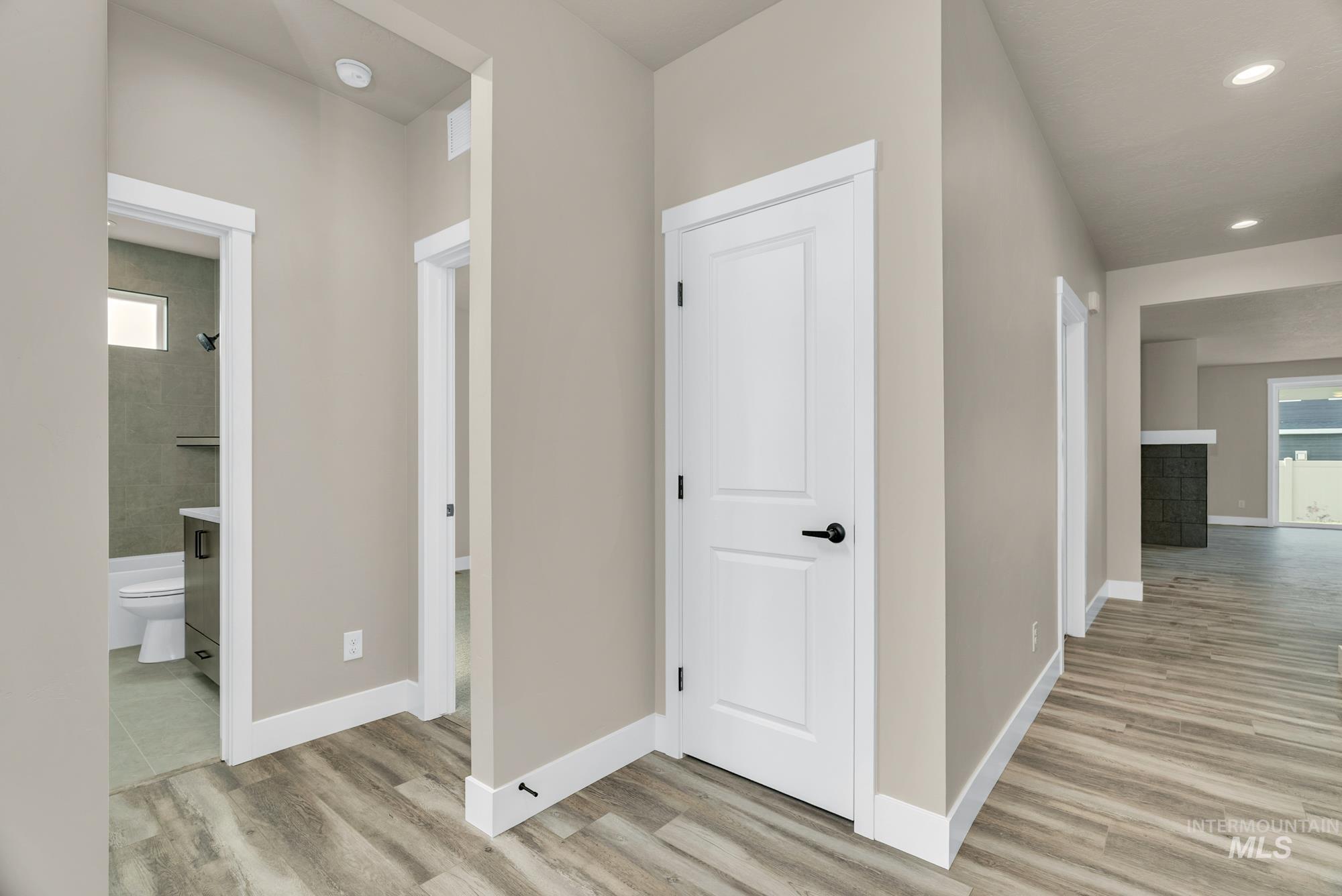2772 West Jutland Street Meridian, ID 83642 - Photo 21 of 25 Hallway featuring recessed lighting and light wood-type flooring