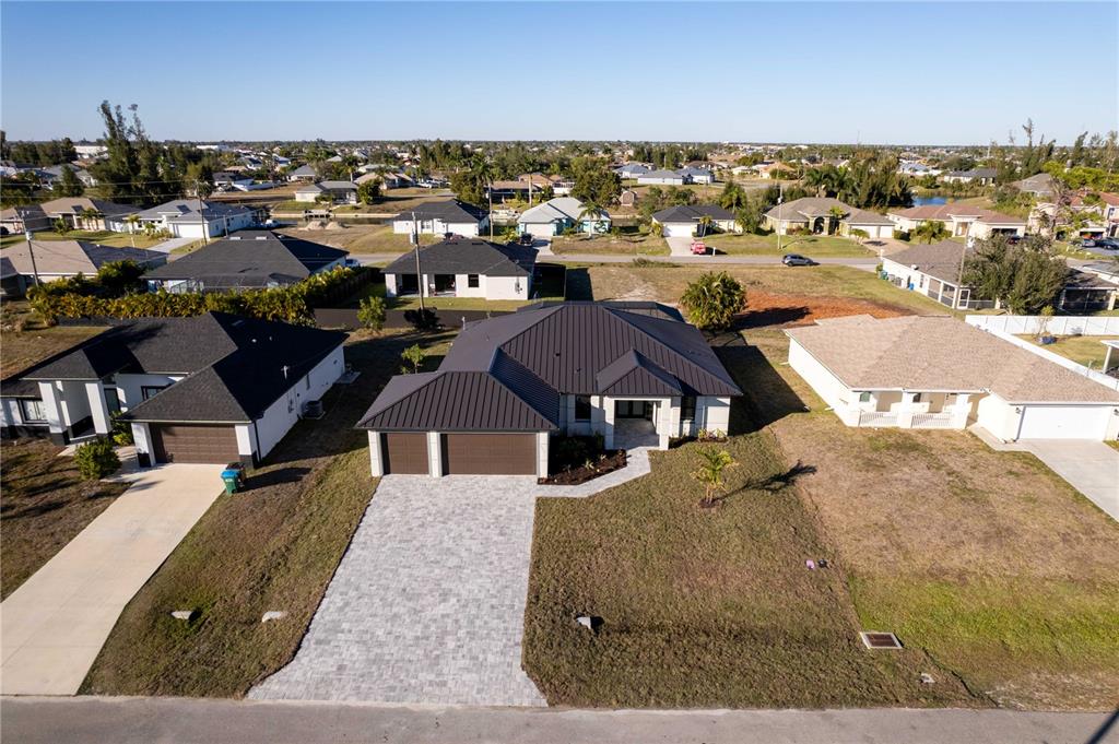 1711 Southwest 3rd Street Cape Coral, FL 33991 - Photo 31 of 45 an aerial view of residential houses with city view