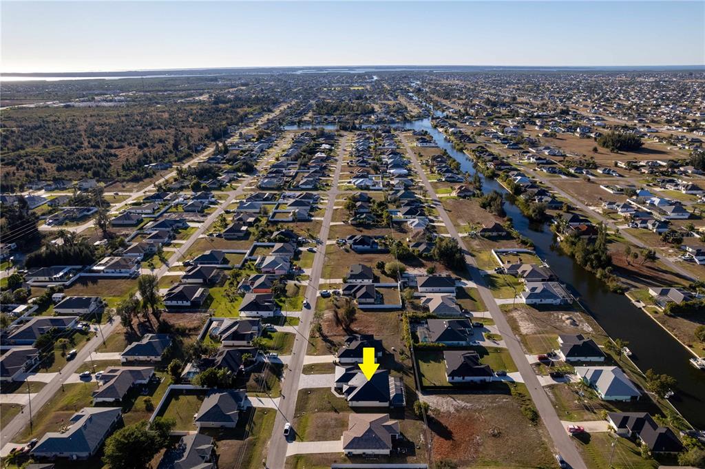 1711 Southwest 3rd Street Cape Coral, FL 33991 - Photo 5 of 45 an aerial view of multiple house