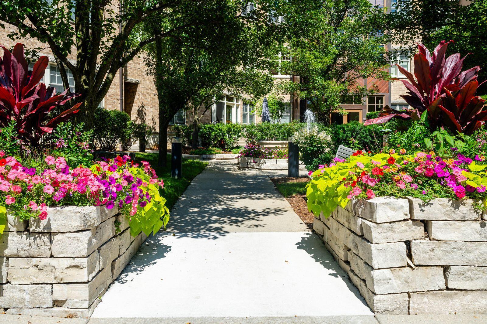 13130 Watertown Plank Road, Unit 101 Elm Grove, WI 53122 - Photo 23 of 24 Courtyard entrance