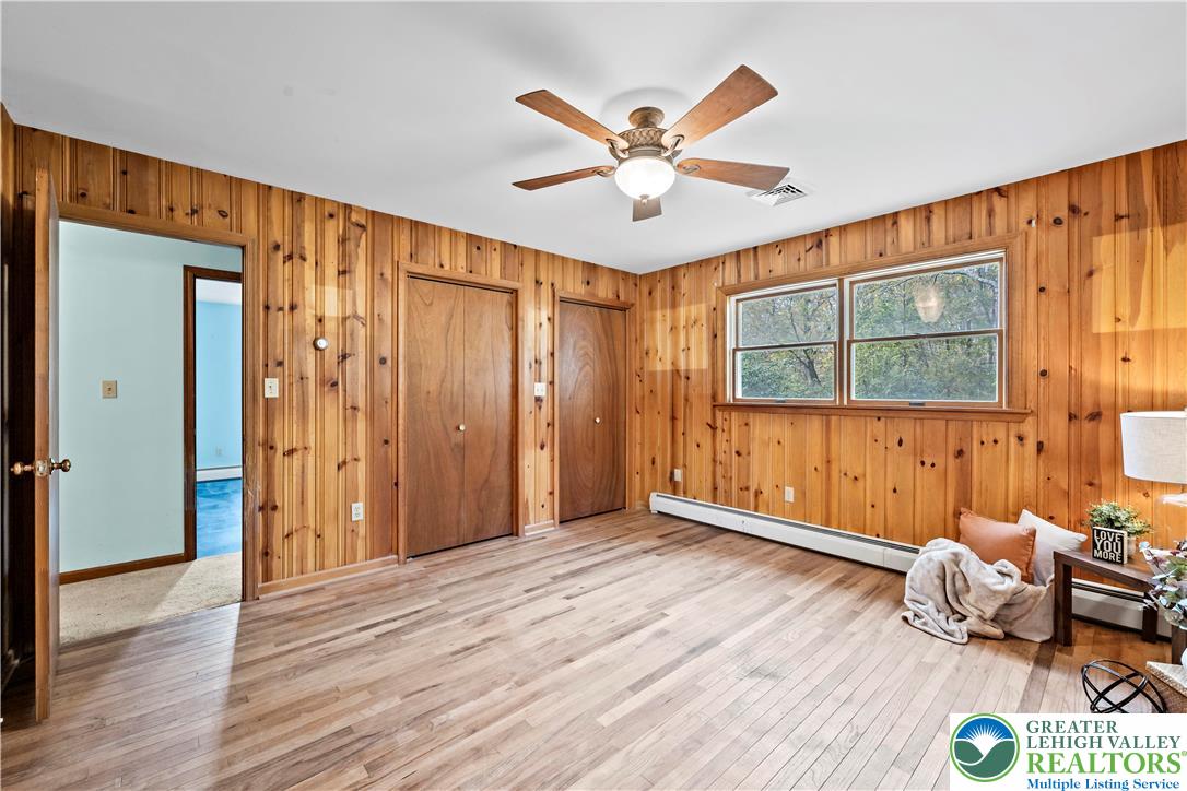 7509 Borman Road New Tripoli, PA 18066 - Photo 23 of 41 a view of an empty room with wooden floor and a window