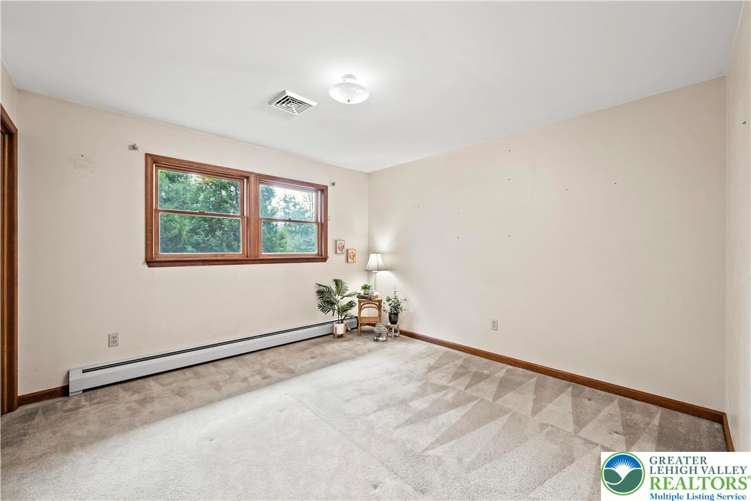 7509 Borman Road New Tripoli, PA 18066 - Photo 24 of 41 an empty room with windows