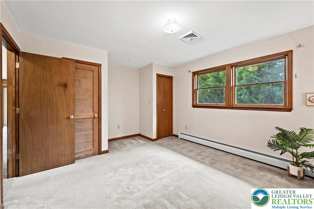 7509 Borman Road New Tripoli, PA 18066 - Photo 25 of 41 an empty room with windows and closet