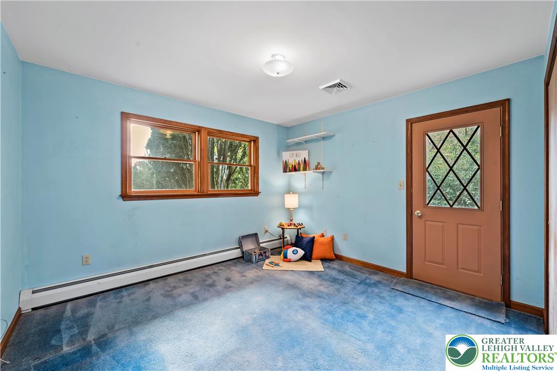 7509 Borman Road New Tripoli, PA 18066 - Photo 26 of 41 a view of room with toys and wooden floor