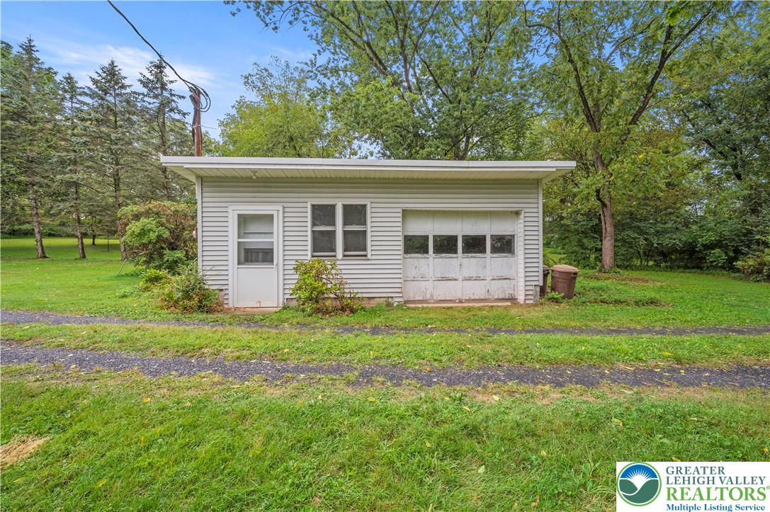 7509 Borman Road New Tripoli, PA 18066 - Photo 33 of 41 a view of a house with a yard