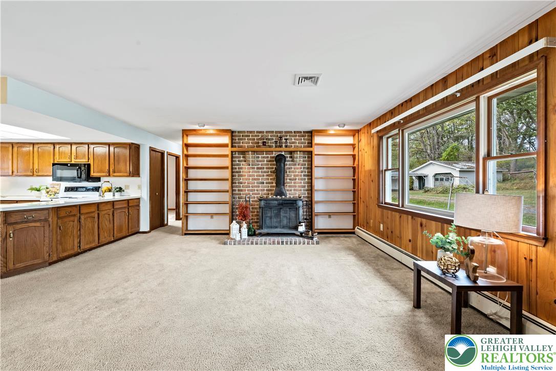 7509 Borman Road New Tripoli, PA 18066 - Photo 6 of 41 a view of a livingroom with furniture and a kitchen