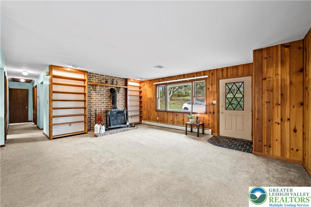 7509 Borman Road New Tripoli, PA 18066 - Photo 7 of 41 a view of an empty room with furniture and a window