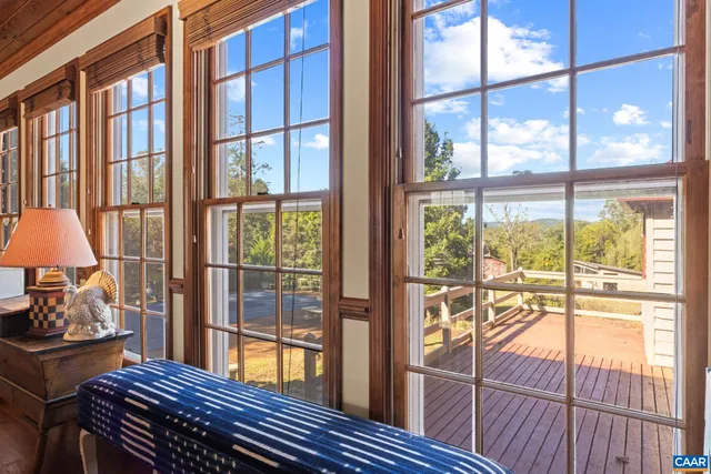 a bathroom with a sink vanity mirror and toilet