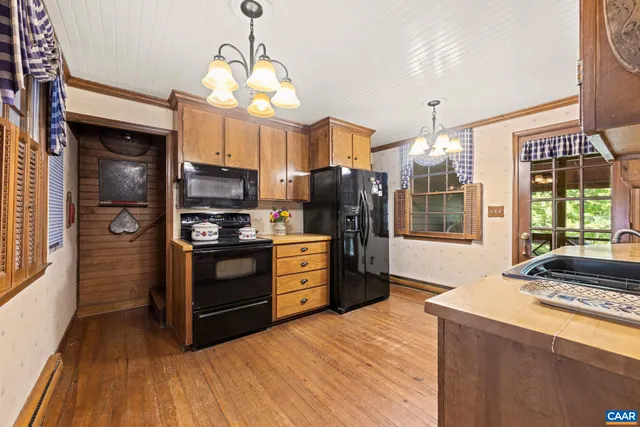 a view of a balcony with wooden floor