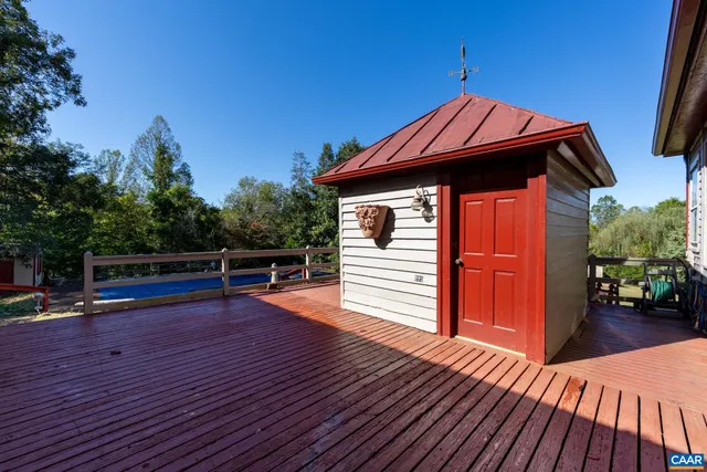 a bathroom with a sink a mirror and a toilet